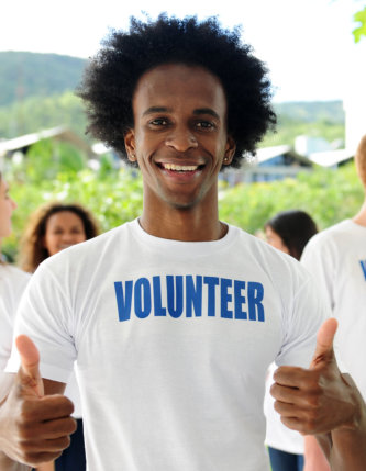 man wearing volunteer shirt
